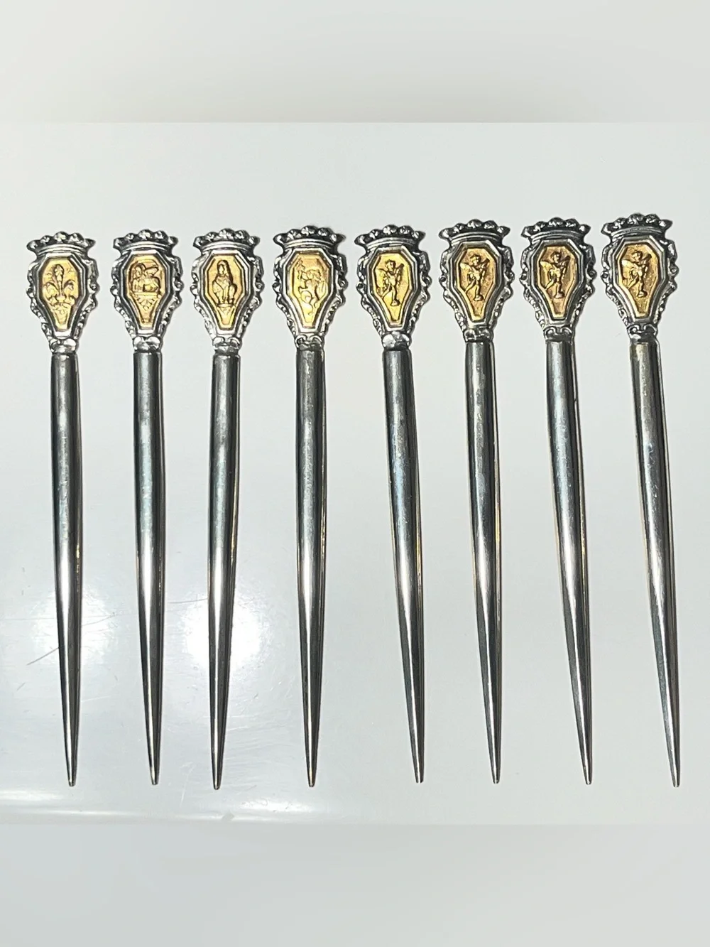 Vintage Silver and Gold-tone Cocktail Picks with Figure/Crest Inlays Set of 8
